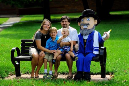 Neal with family and the original Mensch on a Bench